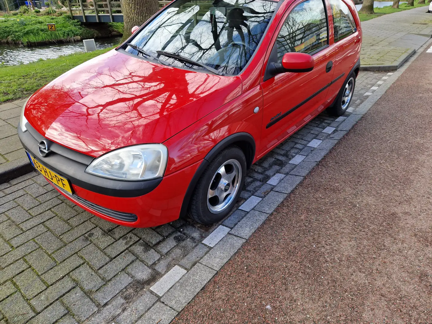 Opel Corsa 1.2-16V Comfort Rojo - 2