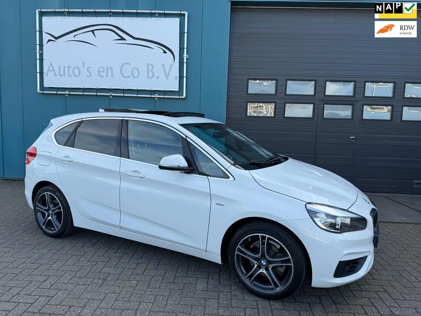 BMW 218 2-serie Active Tourer 218i Executive Panoramadak N Wit - 1