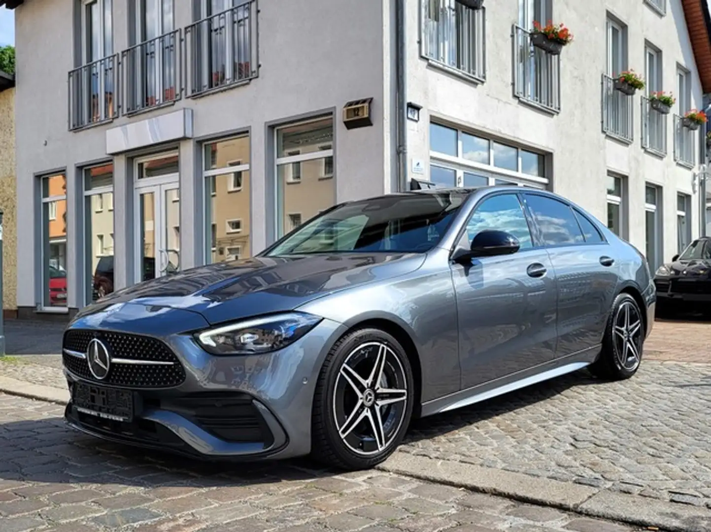 Mercedes-Benz C 300 4M AMG NIGHT PANO MBUX eAHK Grijs - 1
