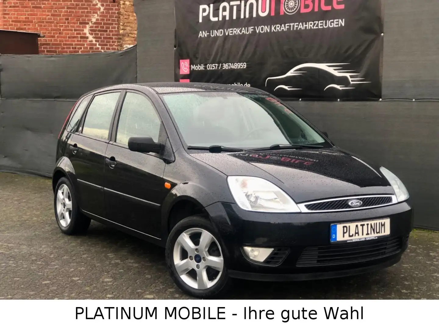 Ford Fiesta 1.6 Benzin 16V *GHIA* 5-Türer *Klima* Schwarz - 1