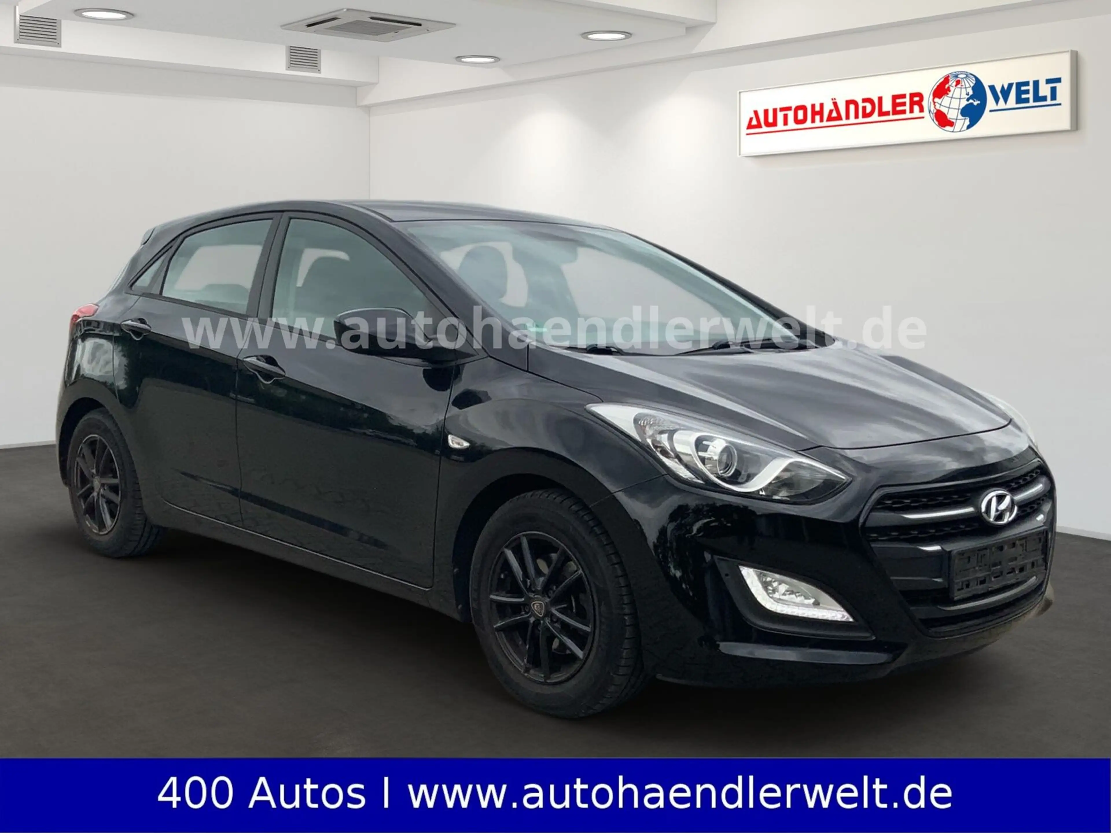 Hyundai i30 1.4 blue — photo 3