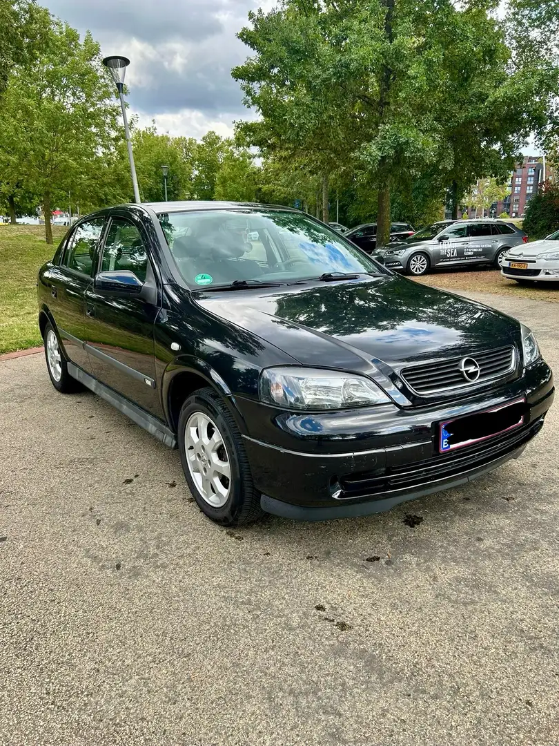 Opel Astra 1.6 Njoy - 1