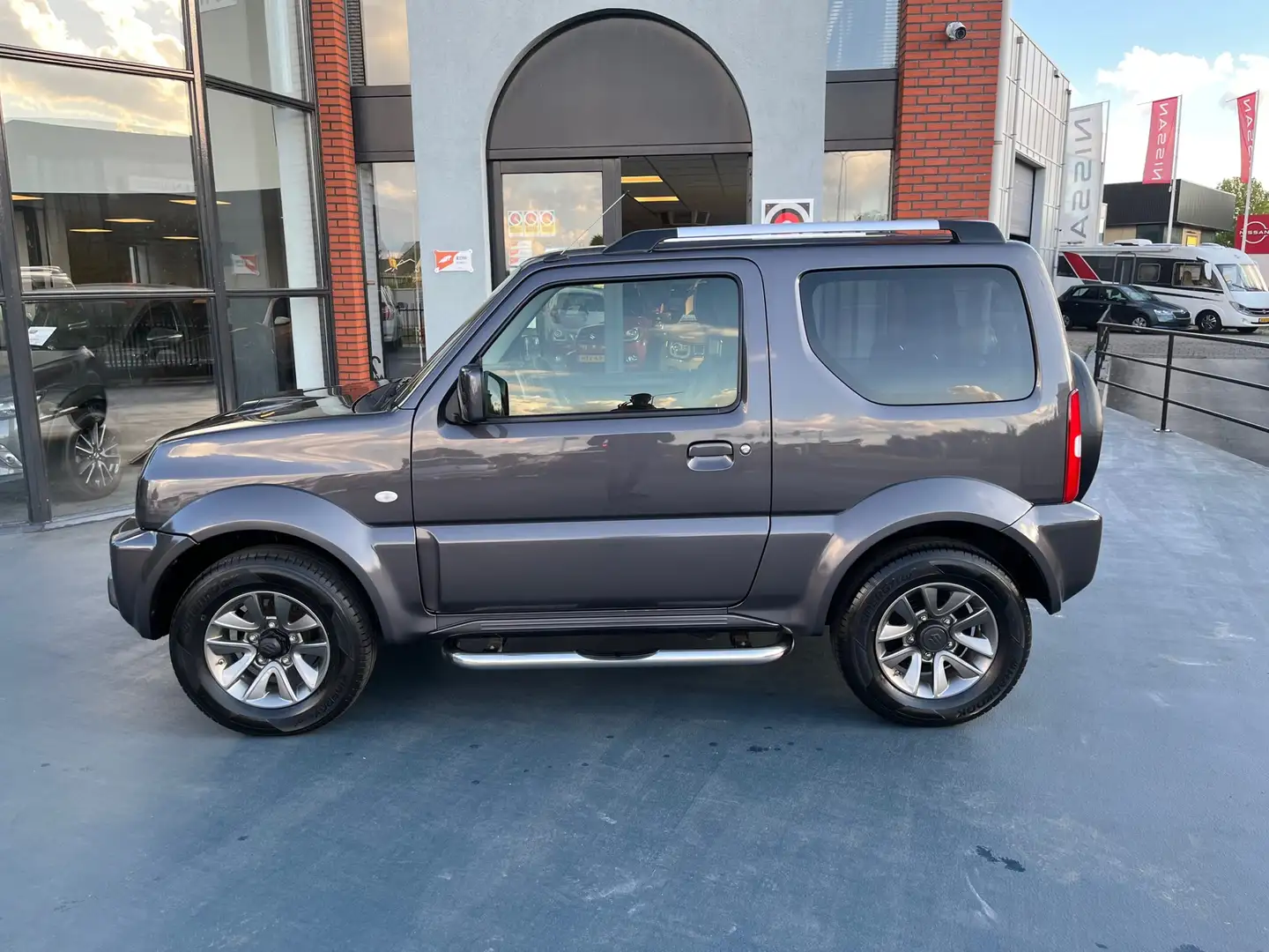 Suzuki Jimny 1.3 Exclusive 4X4 LEDER STOELVERWARMING AIRCO Grau - 2