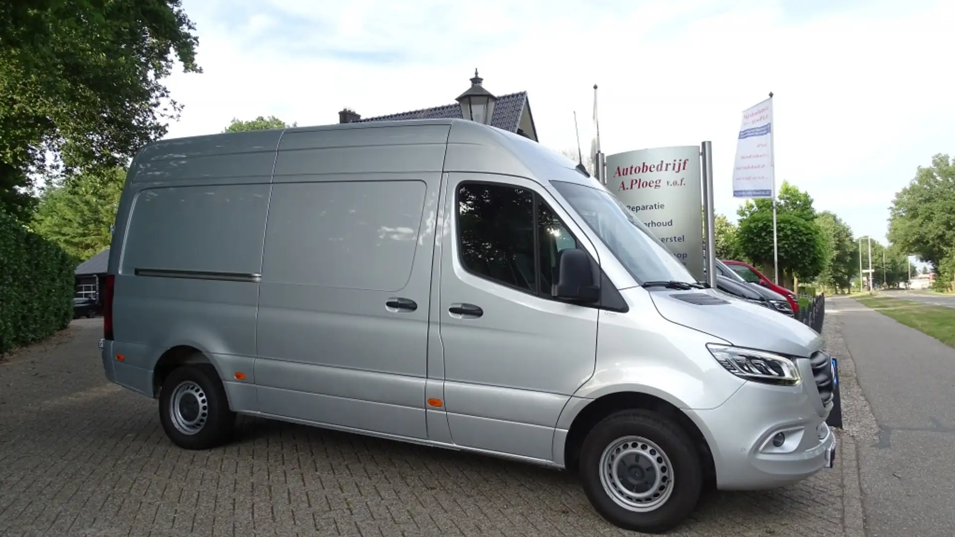 Mercedes-Benz Sprinter 319 1.9 CDI L2H2 VOL OPTIES 1e eig Grijs - 1