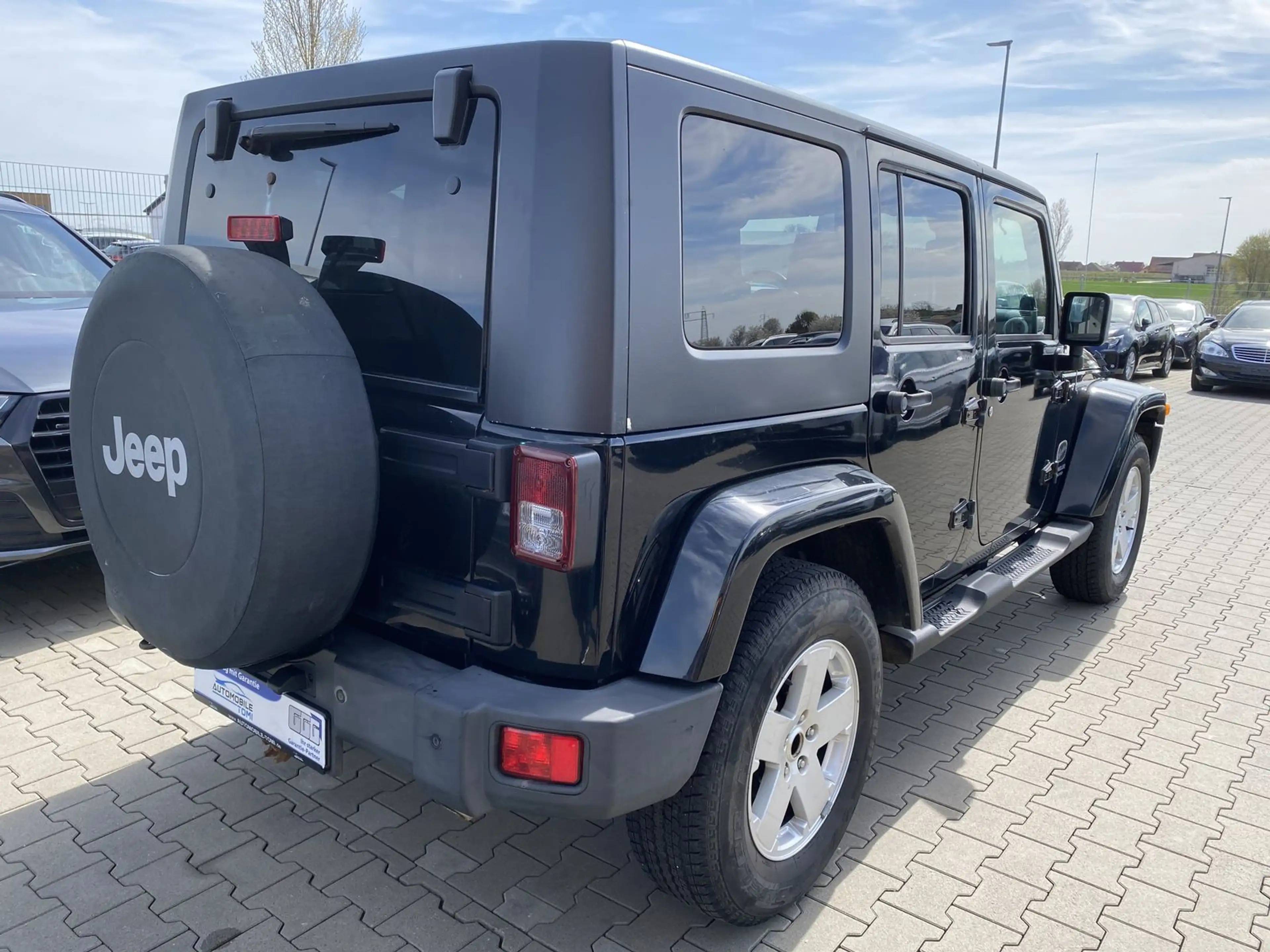 Jeep Wrangler Sahara/Leder/Navi/TÜN NEU/SOFTTOP — photo 10
