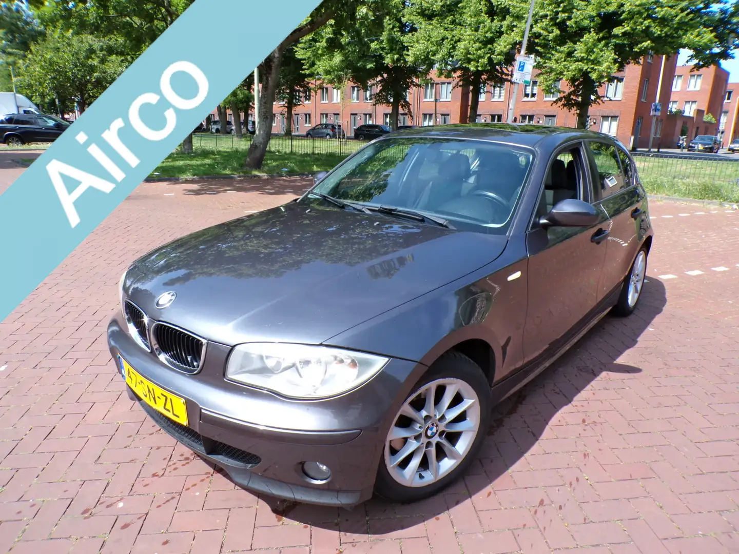 BMW 116 1-serie 116i Executive IJSKOUDE AIRCO SCHUIFKANTEL Сірий - 1
