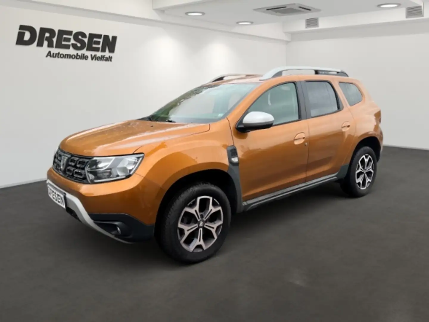 Dacia Duster 125 II Prestige 1.2 TCe Oranje - 1