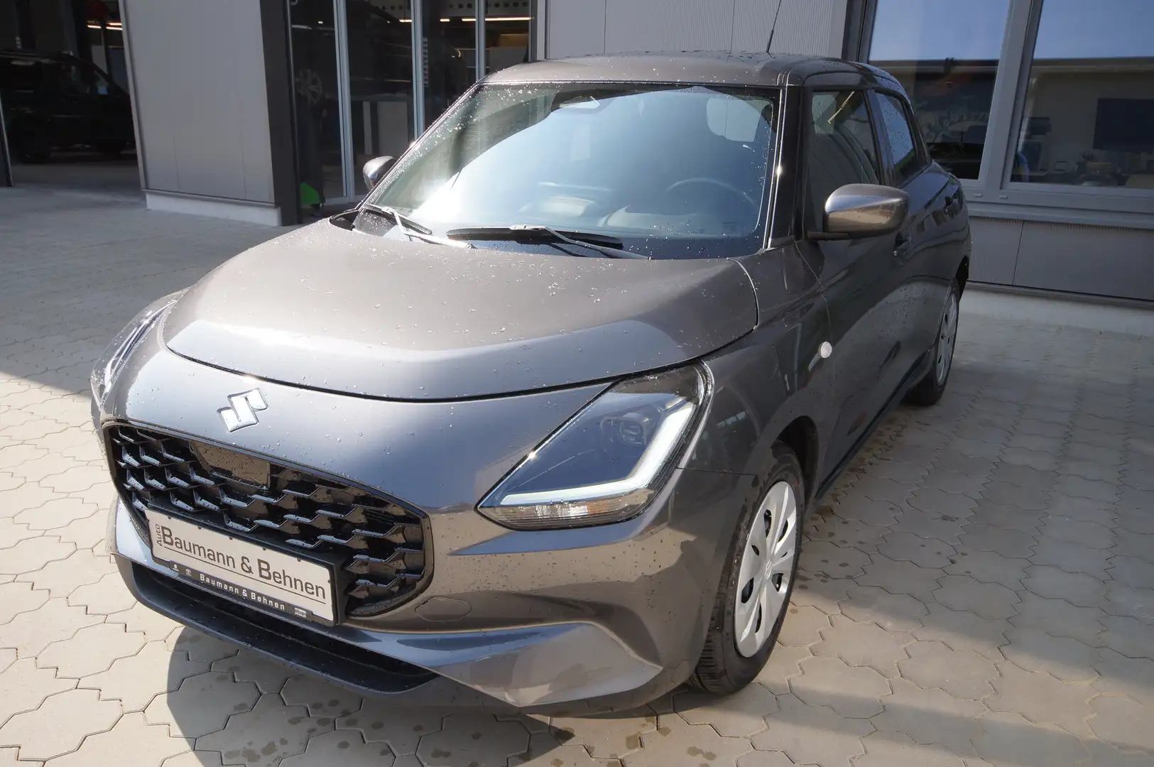 Suzuki Swift 1.2 Hybrid MT Club Grijs - 1