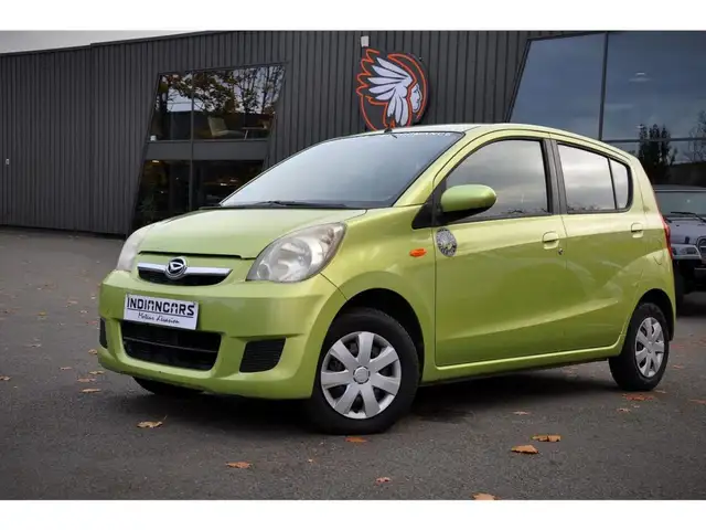 Daihatsu Cuore 1.0i - 69 2007 .