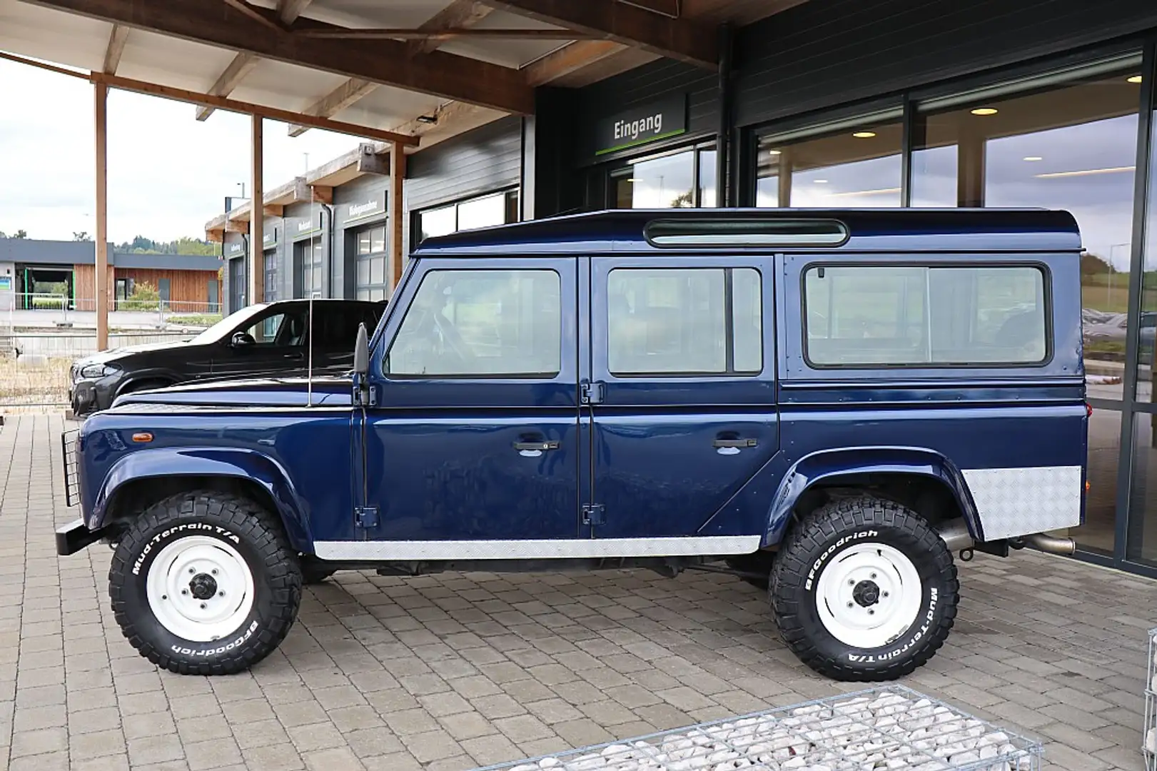 Land Rover Defender 110" Station Wagon 2,5 TD Blau - 2