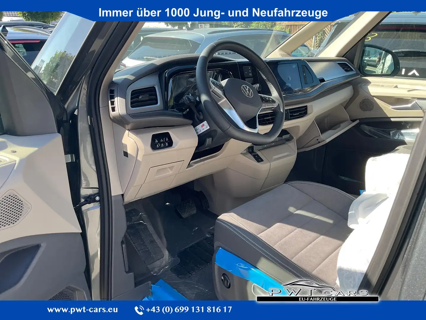 Volkswagen T7 California Beach Camper TDI DSG, 18-Zoll, ArtVelour, Marki... Grigio - 1