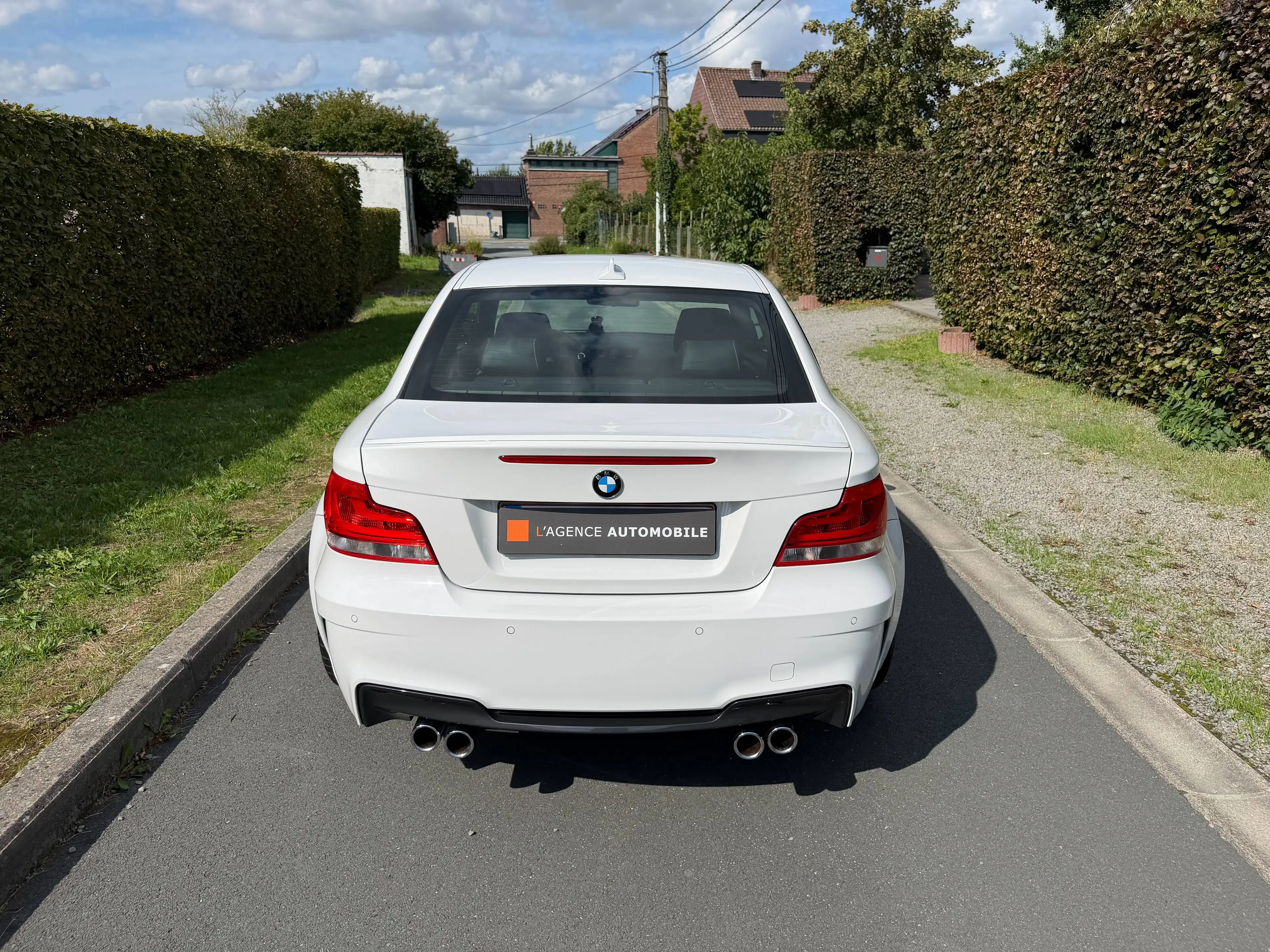BMW M1 Coupé E82 - Alpine White III - Jantes M359 — photo 6