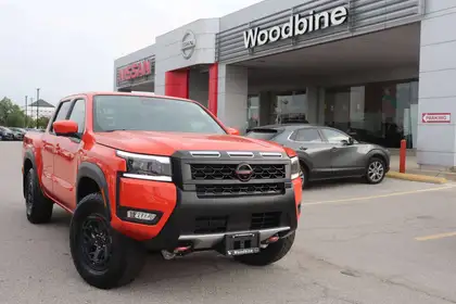Orange 2026 Nissan Frontier Pickup Truck Four-Wheel Drive 9-Speed Automatic