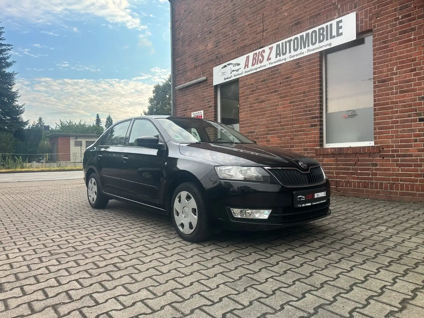 Skoda Rapid/Spaceback Lim. PDC/Klima/SHZ/Tempom./2.Hd/Allwetter Schwarz - 1