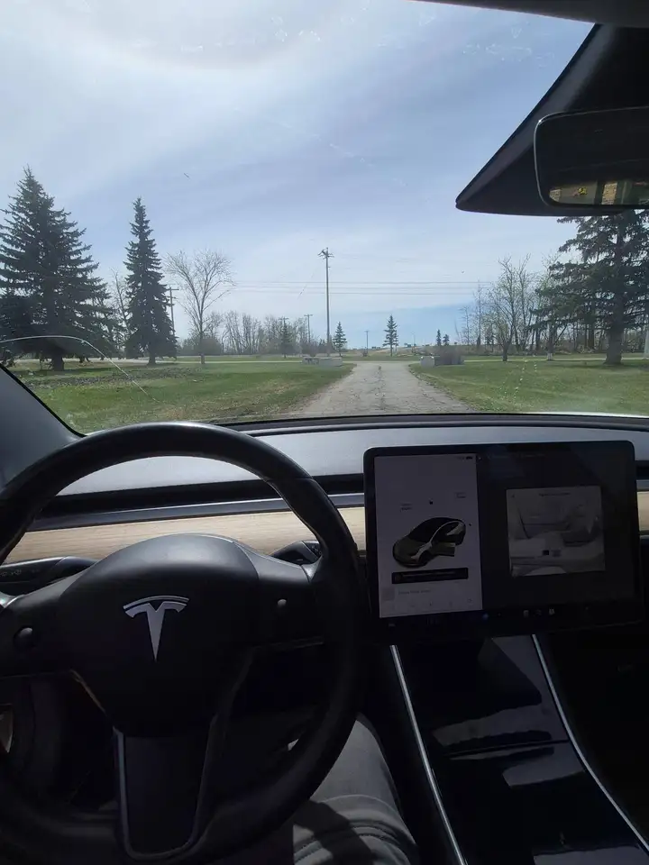 Tesla Model 3 photo Tesla Model 3