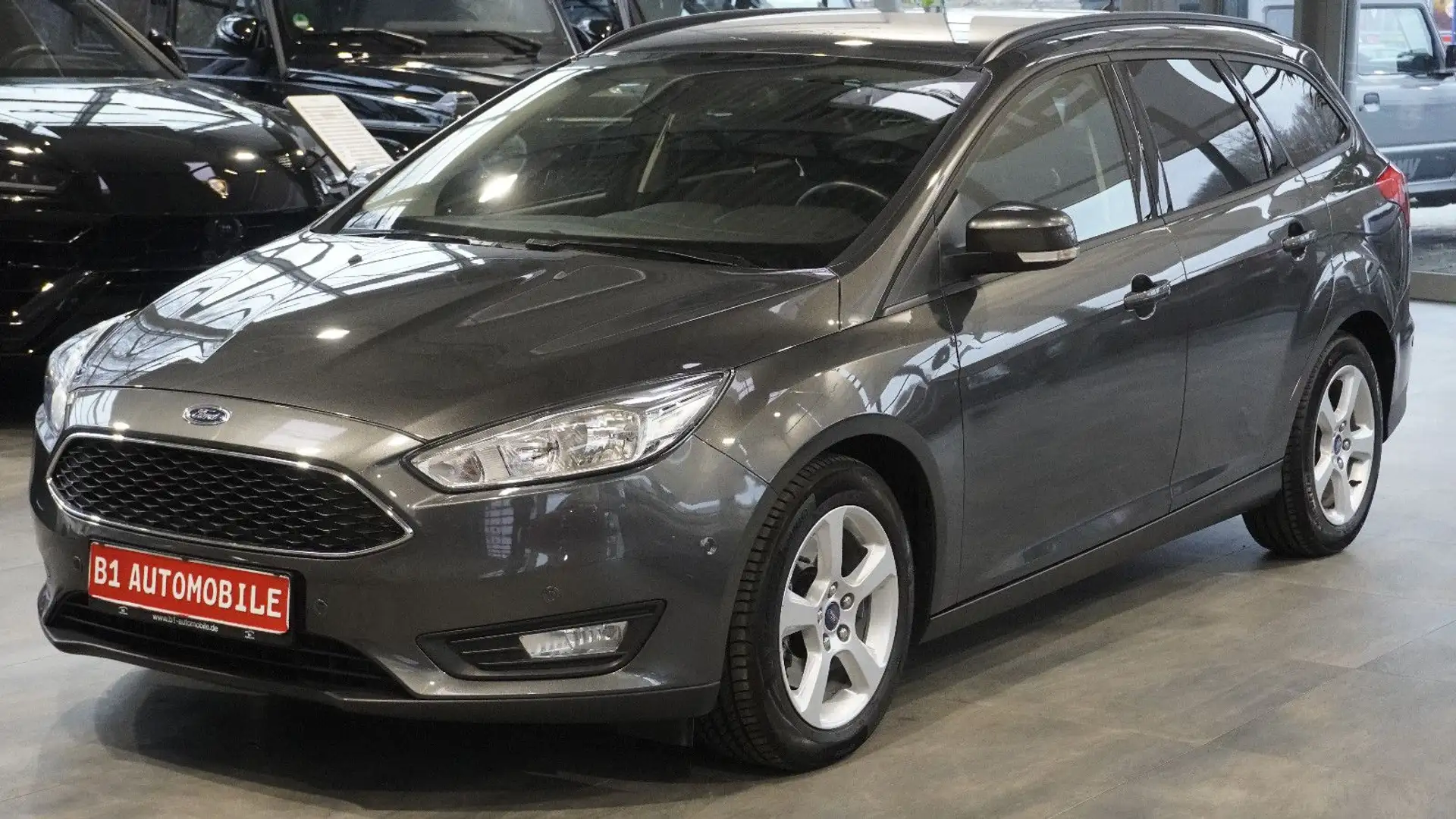 Ford Focus Turnier Business*KAM*NAVI*ORGINAL25KM*1-HA Grau - 1
