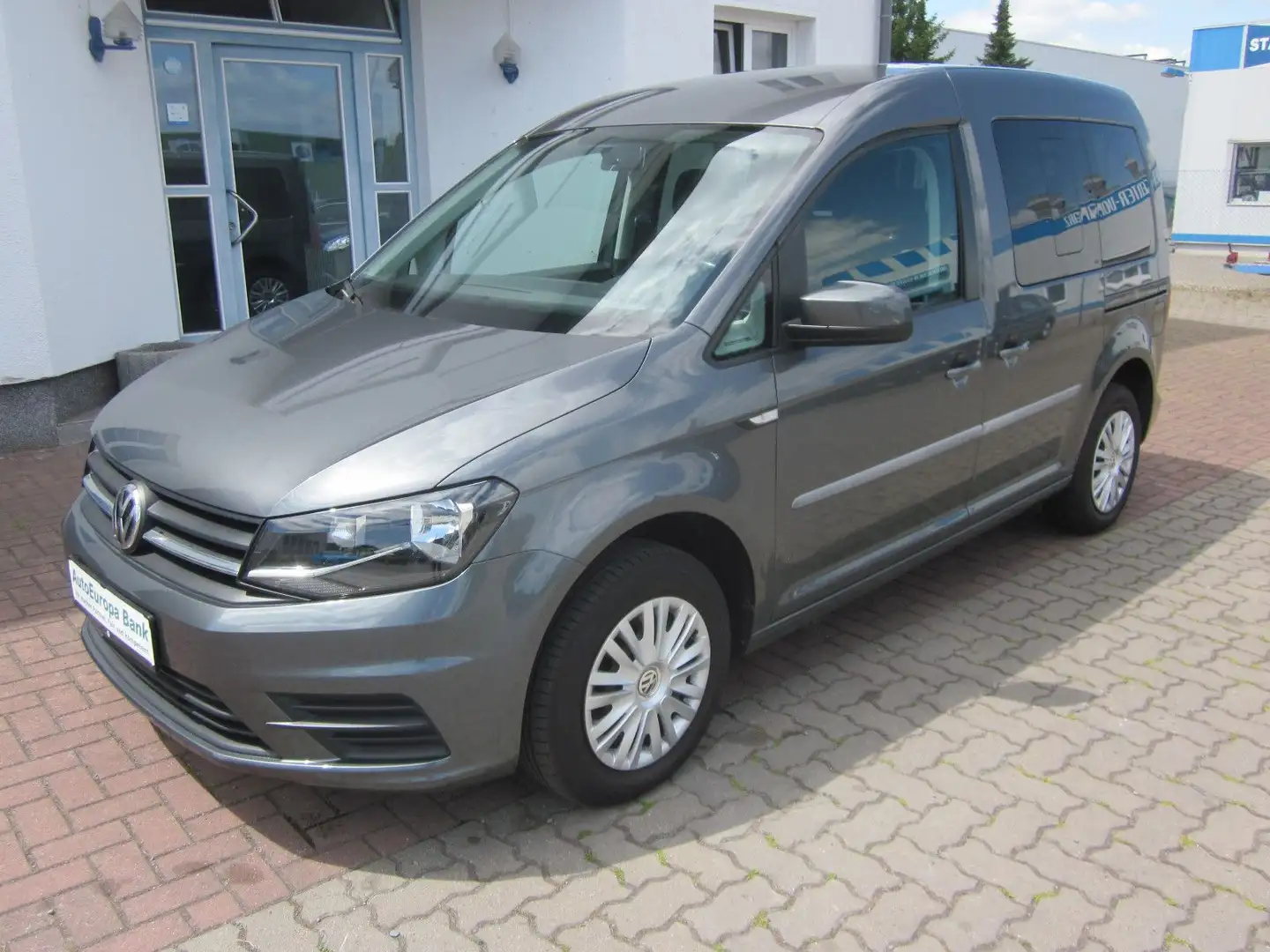 Volkswagen Caddy PKW+7-Sitze+AHK+Klima+SHZ+PDC+MFL+1. Hand Grau - 1