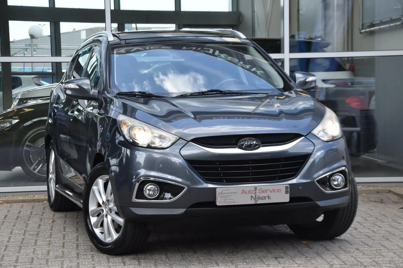 Hyundai iX35 2.0i 4WD i-Catcher Airco Leder Pdc Trekhaak Youngt Grijs - 1