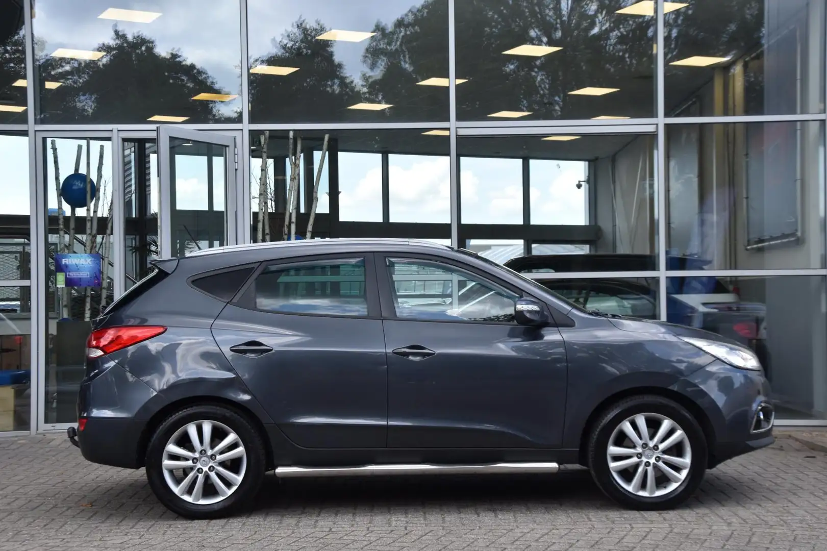 Hyundai iX35 2.0i 4WD i-Catcher Airco Leder Pdc Trekhaak Youngt Grijs - 2