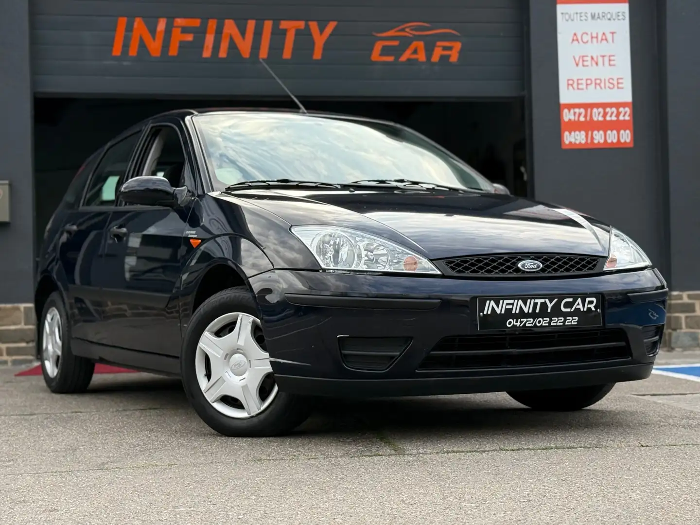 Ford Focus Focus 1.4i SE 16v Ambiente Zwart - 1