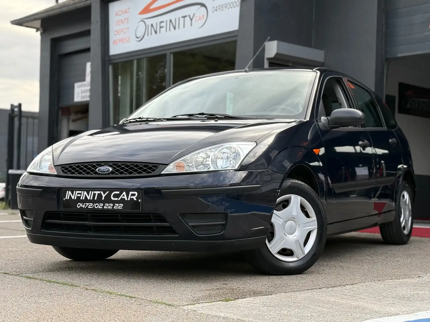 Ford Focus Focus 1.4i SE 16v Ambiente Zwart - 2