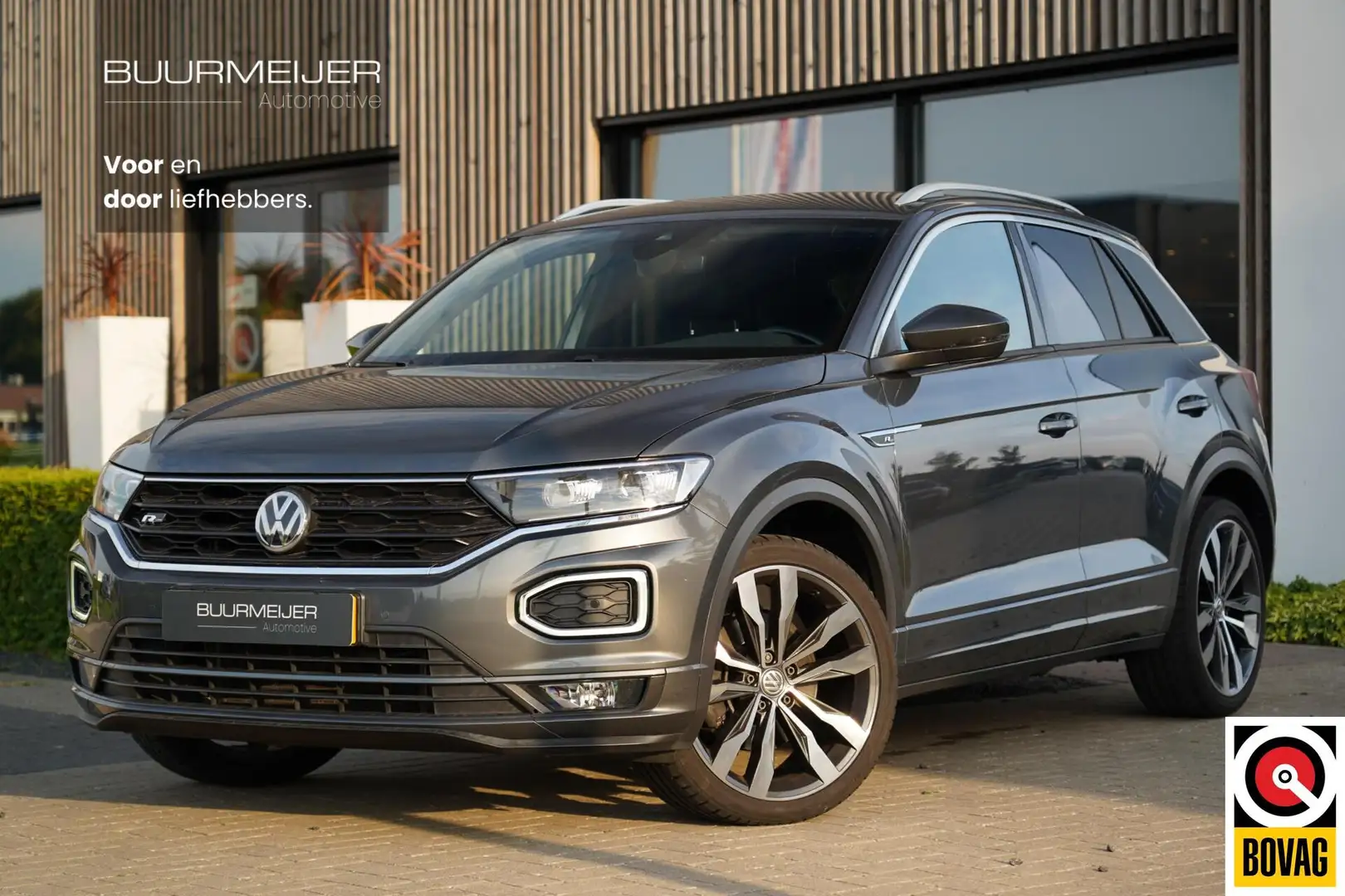 Volkswagen T-Roc 1.5 TSI Sport Business R | Dealer onderhouden | Vi Grijs - 1