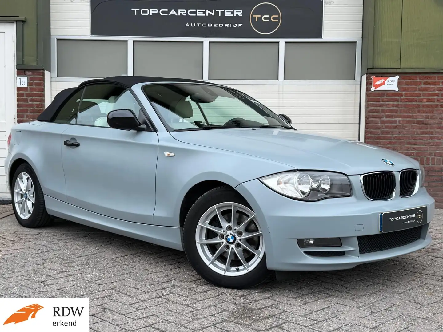 BMW 118 1-serie Cabrio 118iHigh Executive/AIRCO/STOELV/PAR Zwart - 1