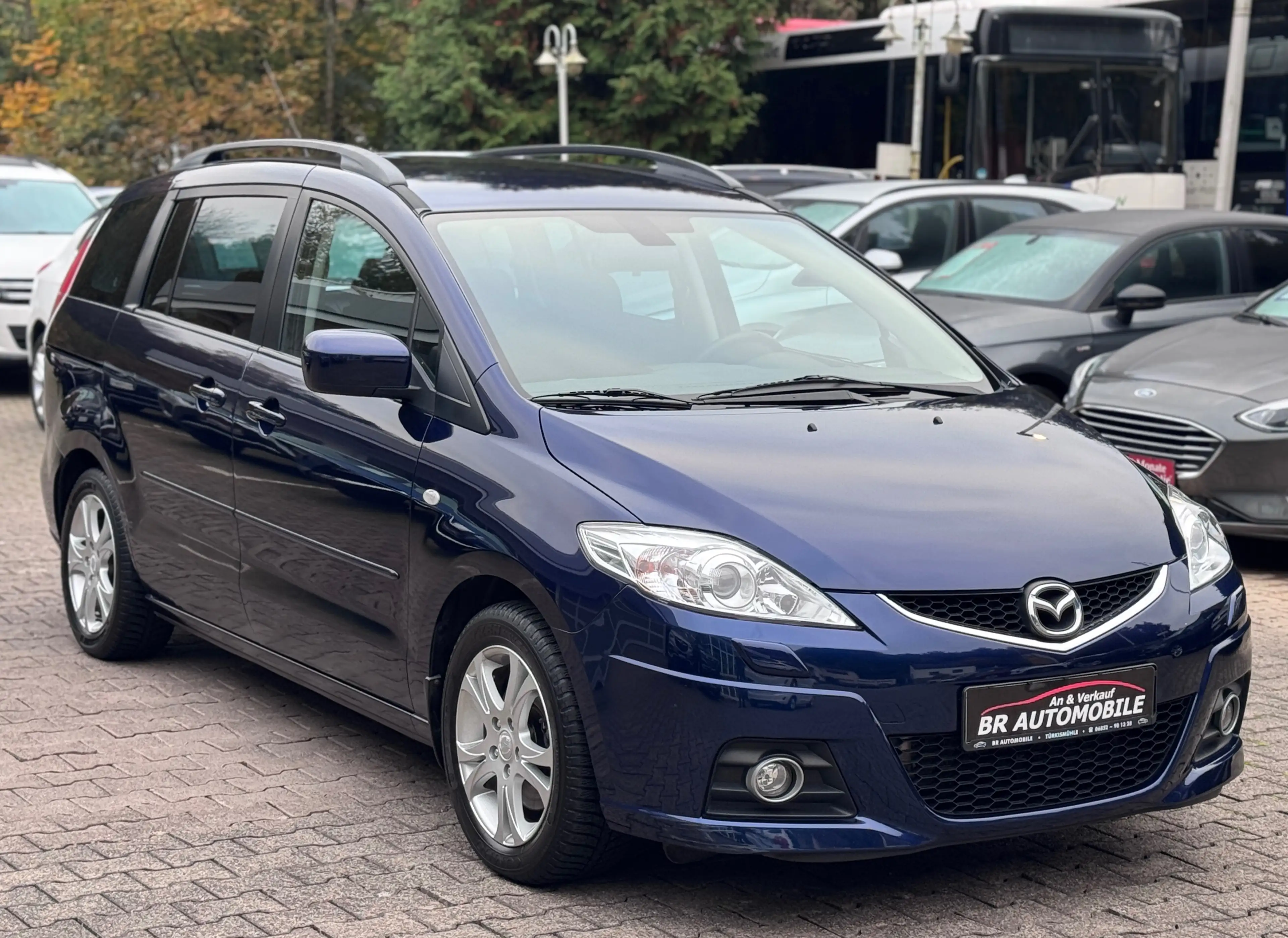 Mazda 5 2.0 Top*7-Sitze*Xenon*AHK*SR/WR-Alu*Tüv 03/27 — photo 2