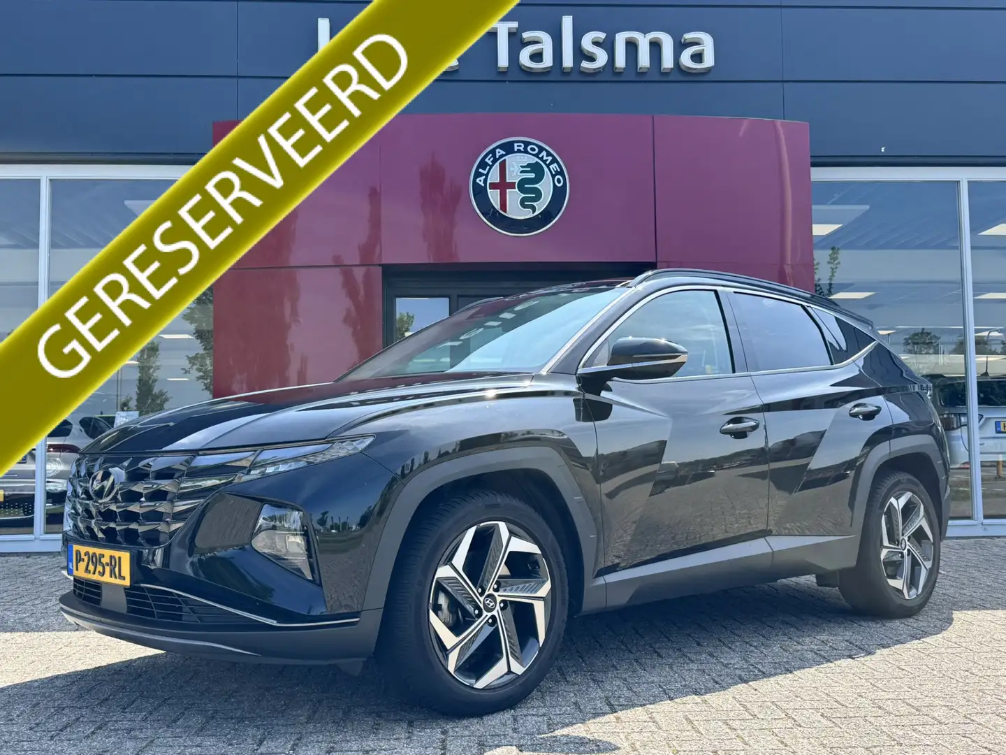 Hyundai TUCSON 1.6 T-GDI HEV Premium Sky | Panorama | Carplay | S Zwart - 1