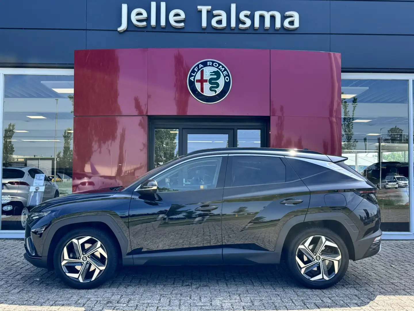 Hyundai TUCSON 1.6 T-GDI HEV Premium Sky | Panorama | Carplay | S Zwart - 2