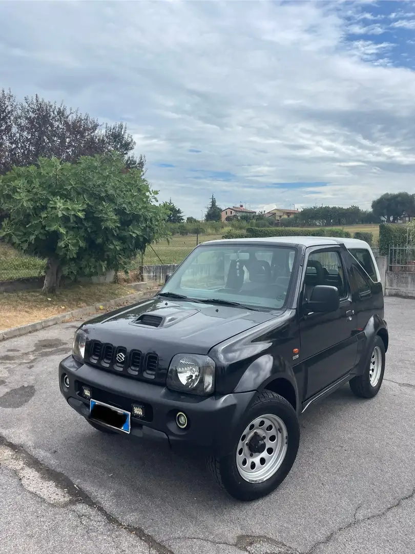 Suzuki Jimny 1.5 ddis td 4wd convert. tettuccio rigido Černá - 1
