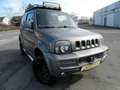 Suzuki Jimny Comfort Lim.4x4*AHK*Klima*Navi*LED Grau - thumbnail 1