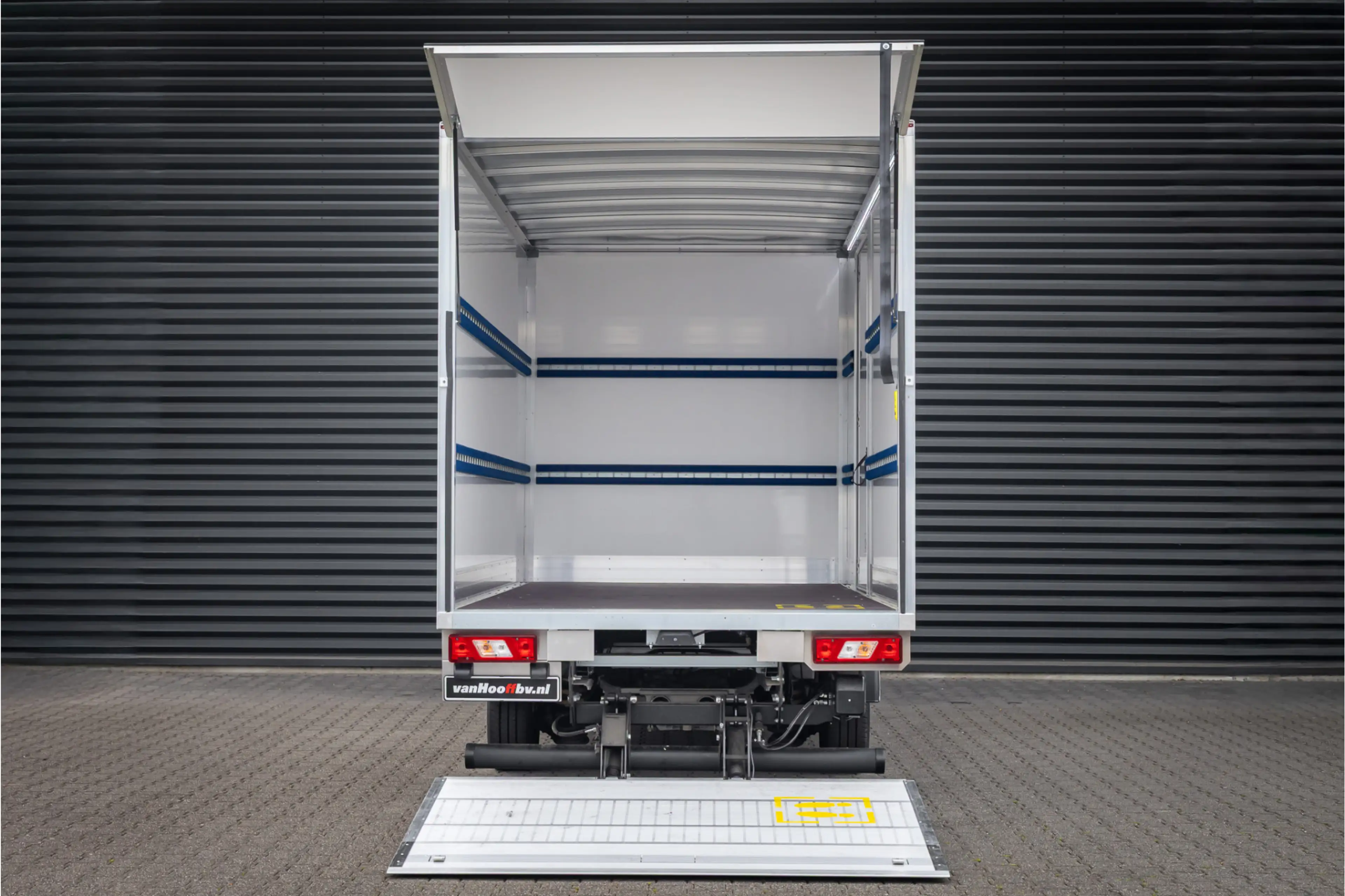 Ford E-Transit Bakwagen met laadklep Rolstops — photo 23