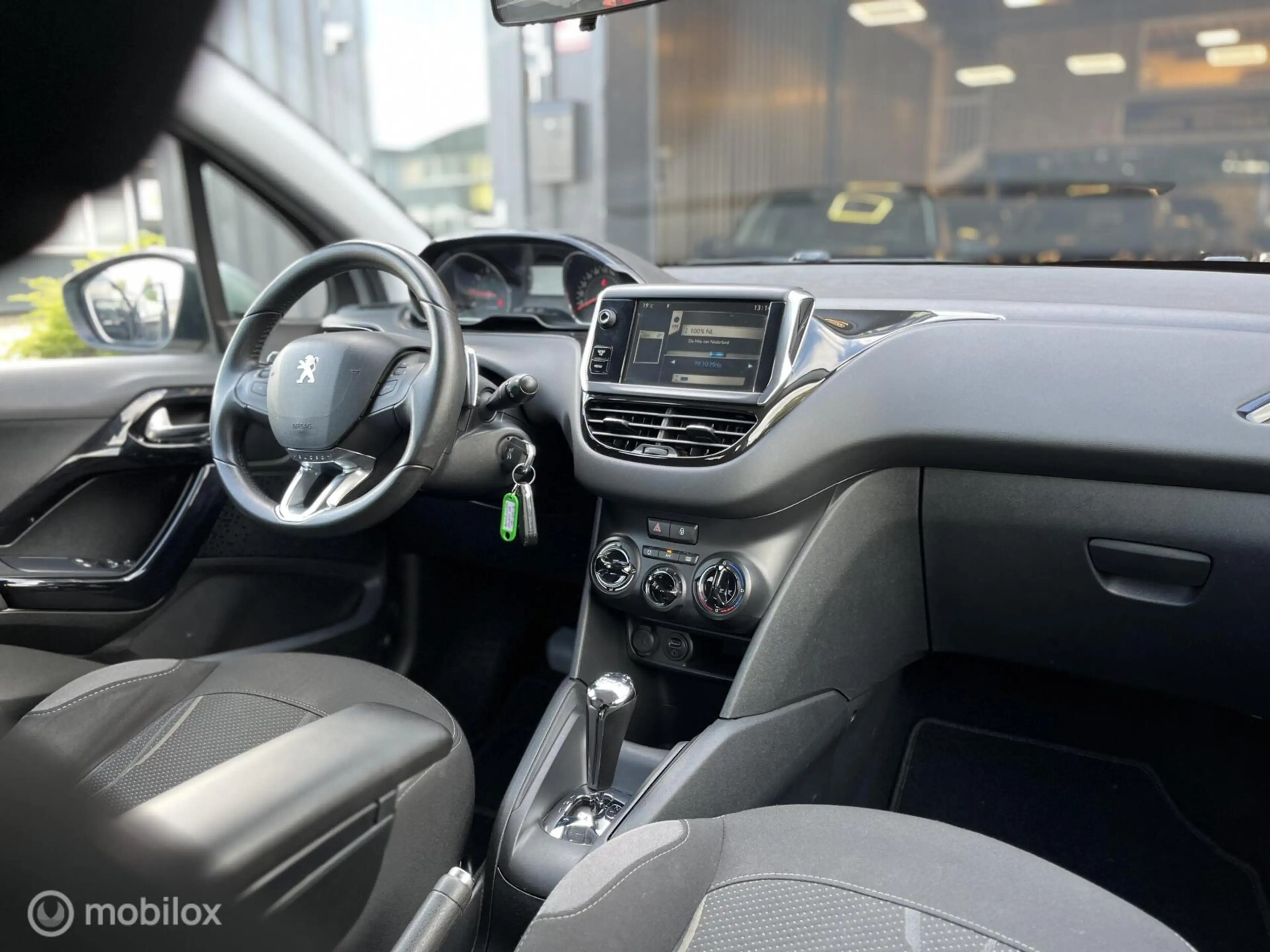 Peugeot 208 1.2 e-VTi Blue Lease Automaat|Cruise|Parkeersensor — photo 23