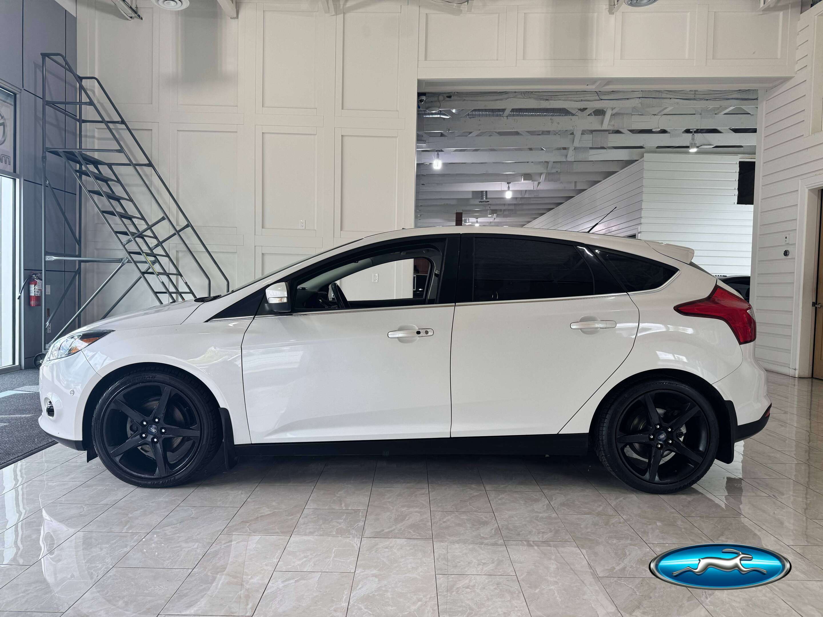 White 2012 Ford Focus Titanium Hatchback Hatchback Front-Wheel Drive Automatic