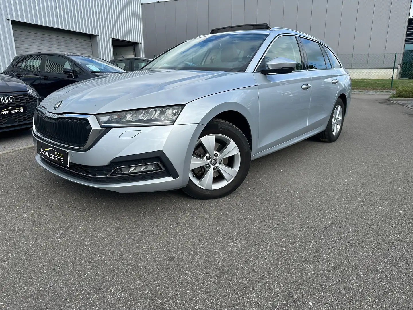 Skoda Octavia Combi 1.5 TSI Ambition 150pk, PANO+OPEN DAK/KEYLES Plateado - 1