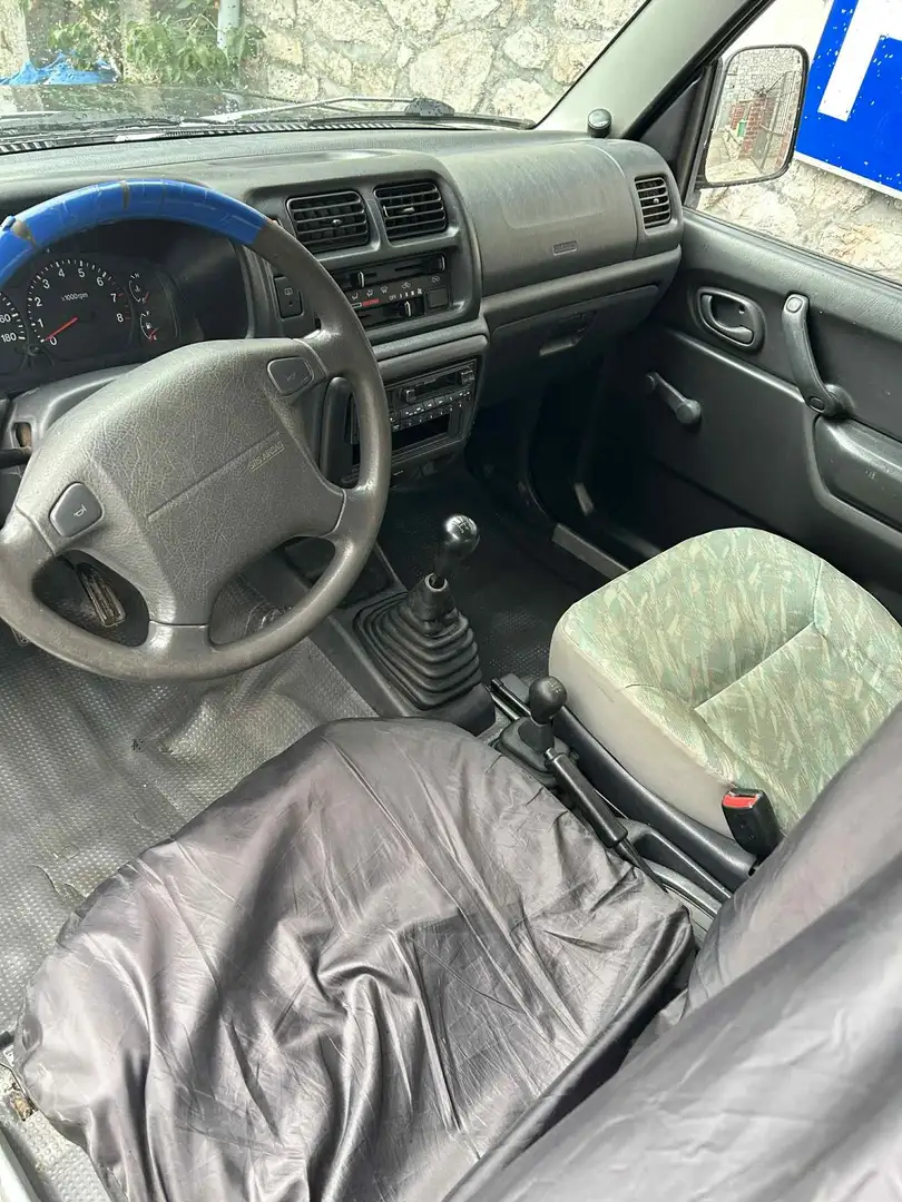 Suzuki Jimny 1.3i JLX Noir - 2