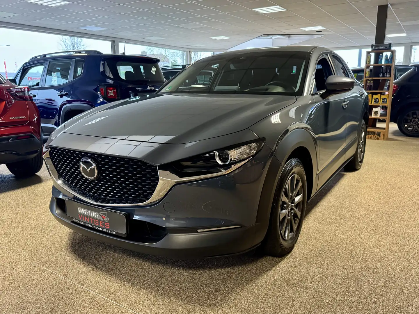 Mazda CX-30 2.0 e-SkyActiv-G M Hybrid Navigatie Head up Displa Grijs - 1