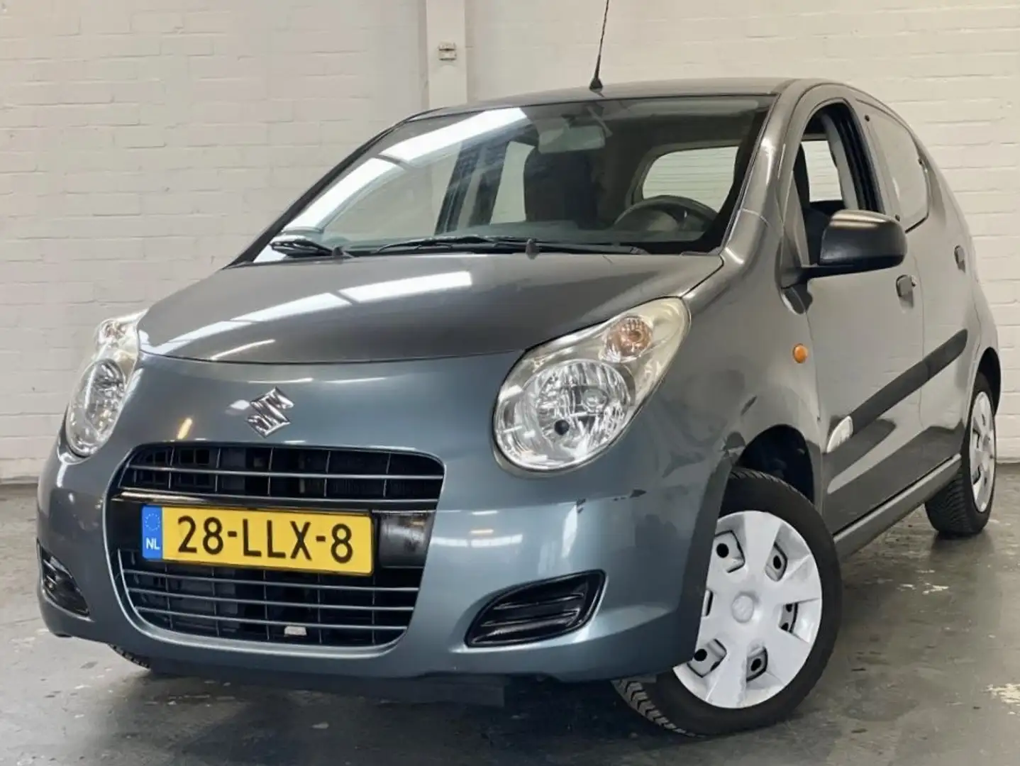 Suzuki Alto 1.0 Base |Airco |Stuurbkr |5deurs |Nieuwe APK Grijs - 1