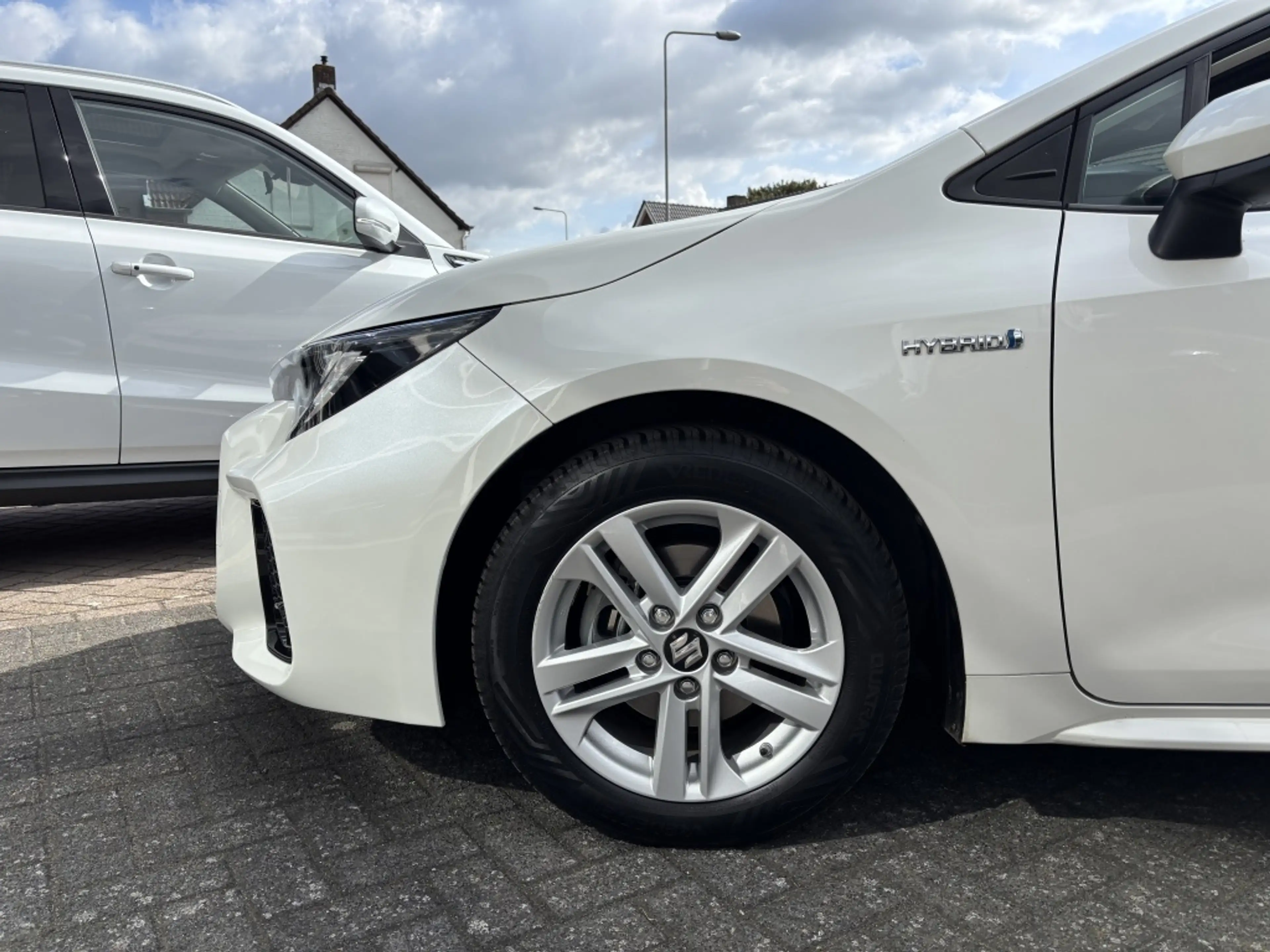 Suzuki Swace 1.8 Hybrid 122pk CVT Select | All season banden | — photo 21
