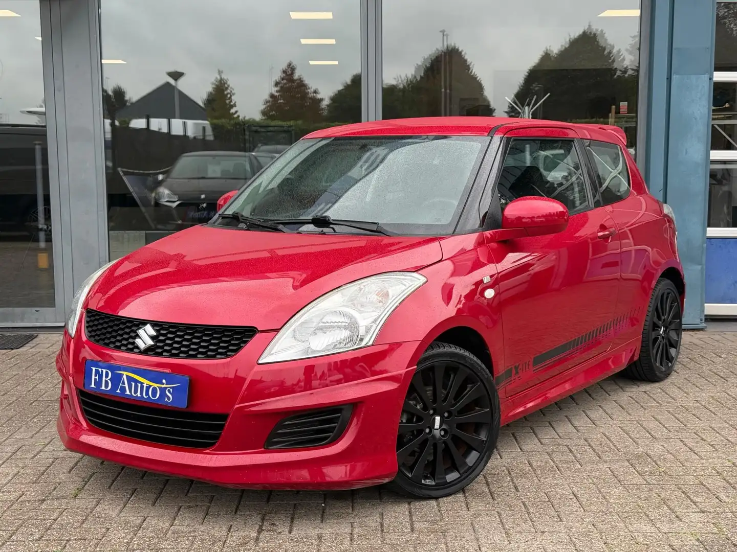 Suzuki Swift 1.2 X-ite Airco Lmv Rood - 1