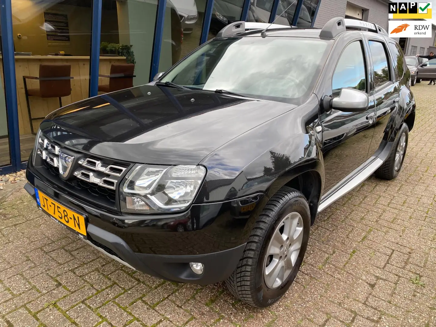 Dacia Duster 1.2 TCe 4x2 Prestige LEER / NAVI / PDC Zwart - 1