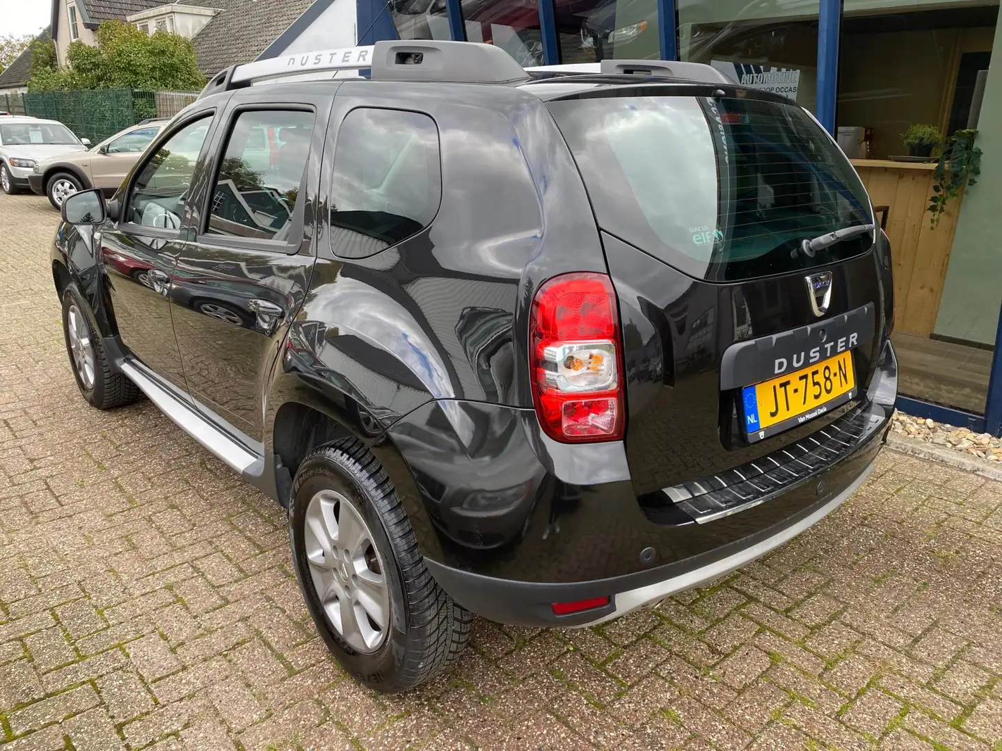 Dacia Duster 1.2 TCe 4x2 Prestige LEER / NAVI / PDC Zwart - 2