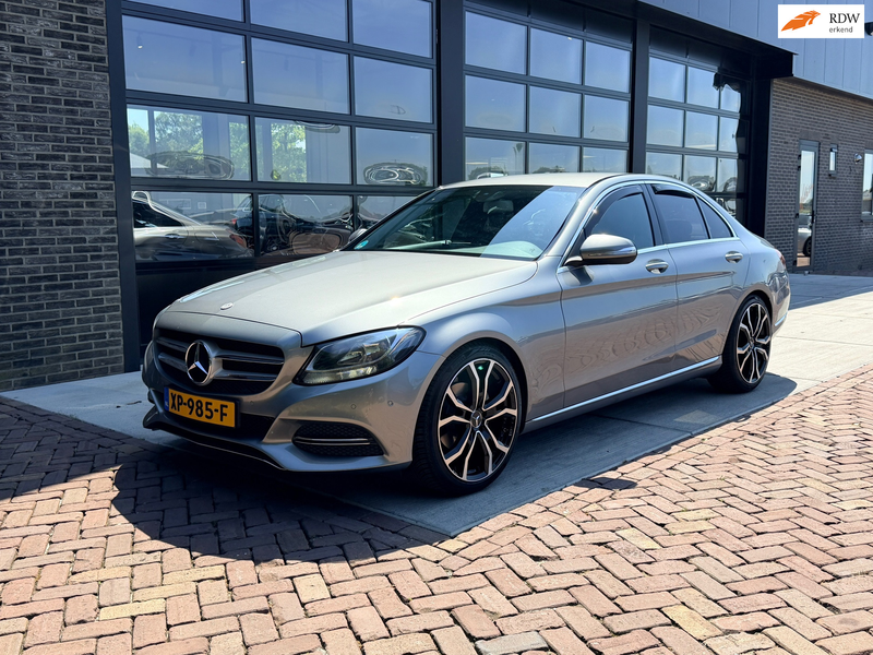 Mercedes-Benz C 180 | Automaat | 1/2 Leer | Stoelver | Navi |