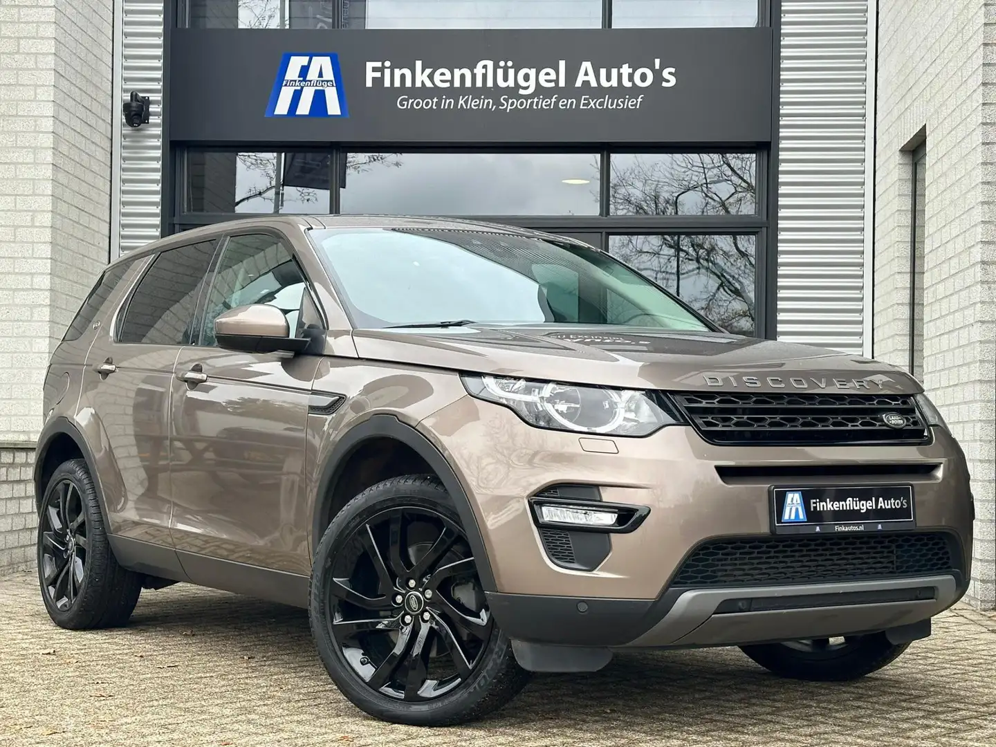 Land Rover Discovery Sport 2.0 Si4 4WD HSE 7p. |Panorama |Trekhaak |Camera | Brun - 1