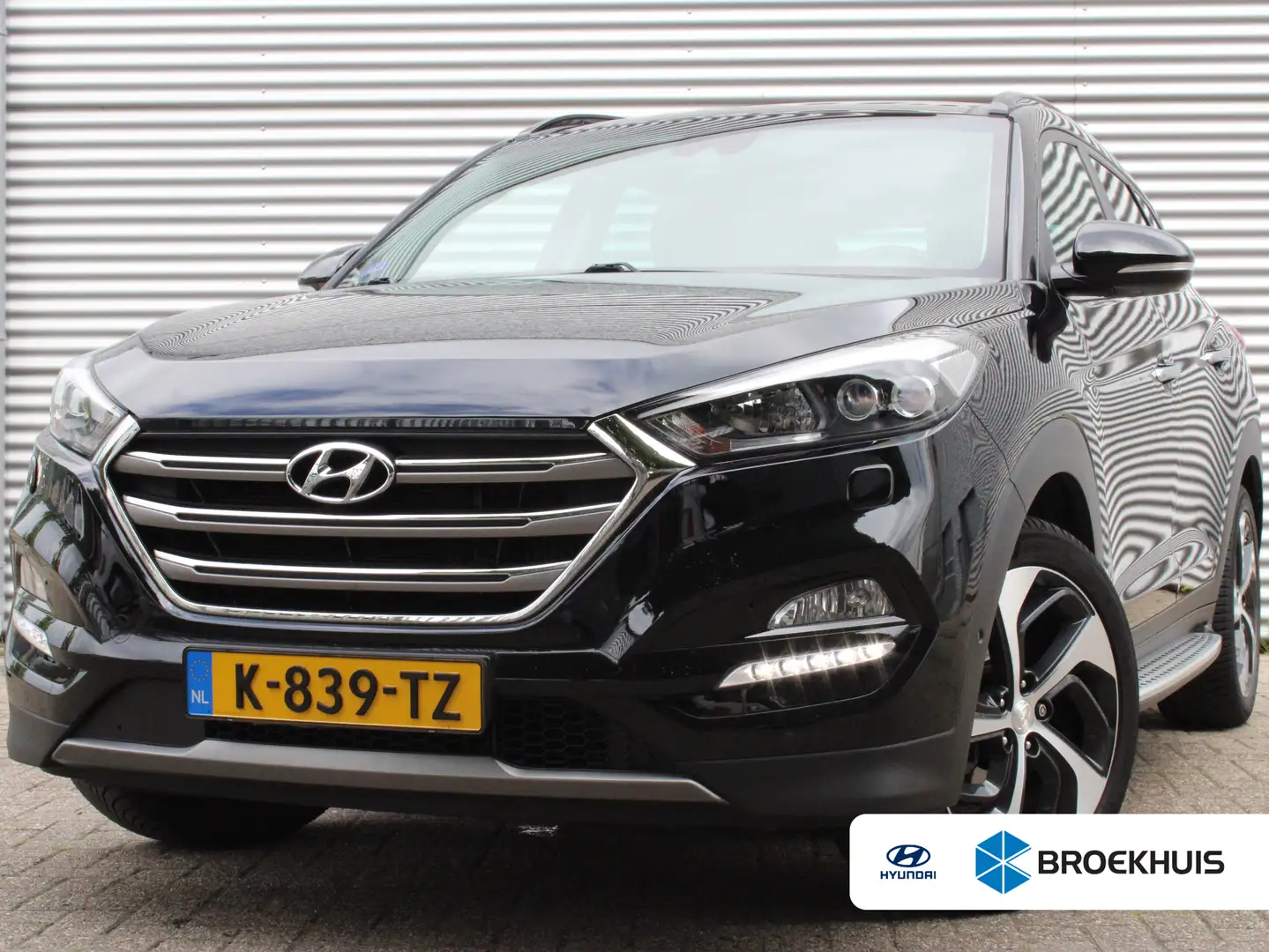 Hyundai TUCSON 1.6 T-GDi Premium 4WD | Elektrisch glazen panorama Zwart - 1