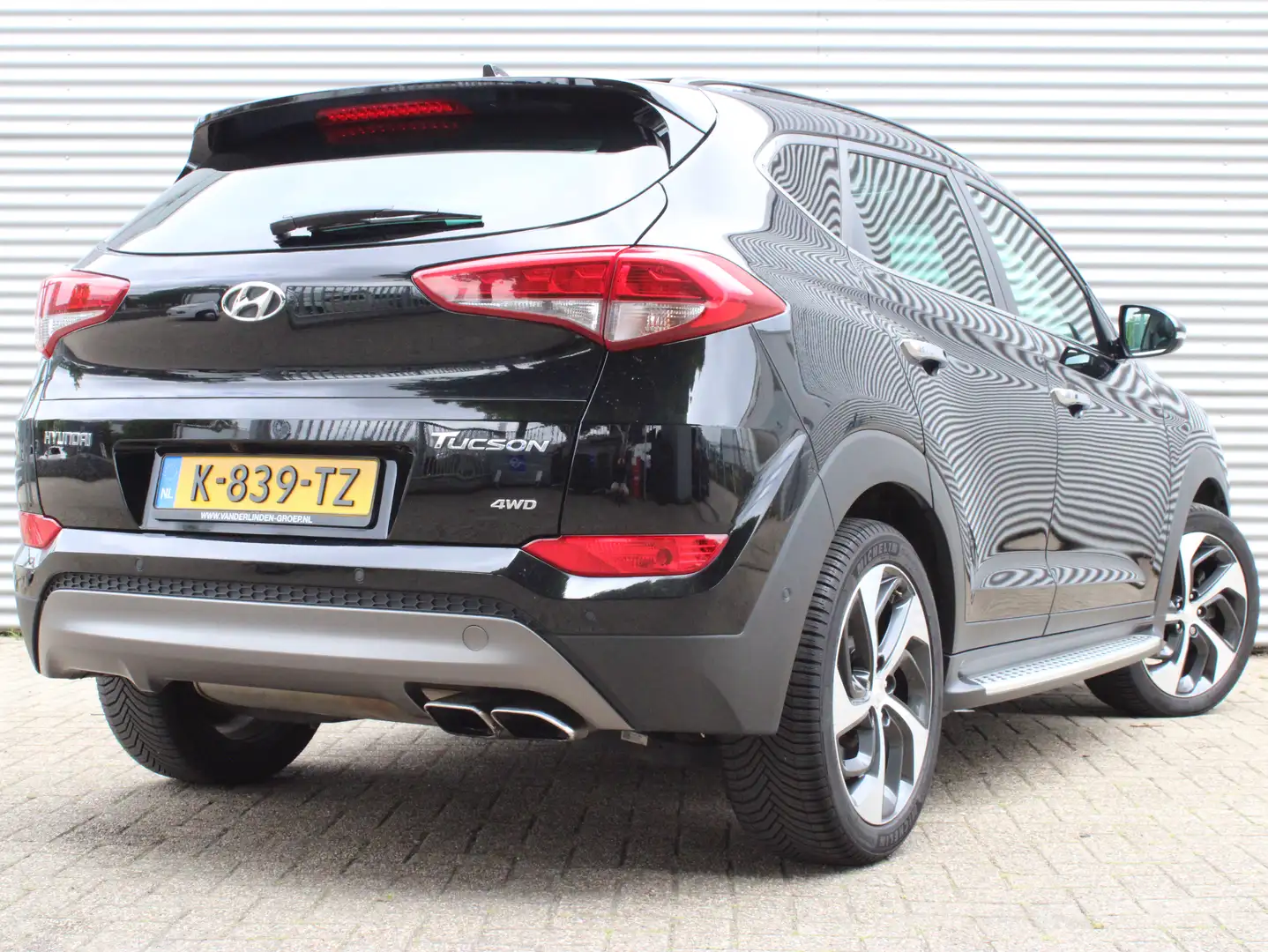 Hyundai TUCSON 1.6 T-GDi Premium 4WD | Elektrisch glazen panorama Zwart - 2