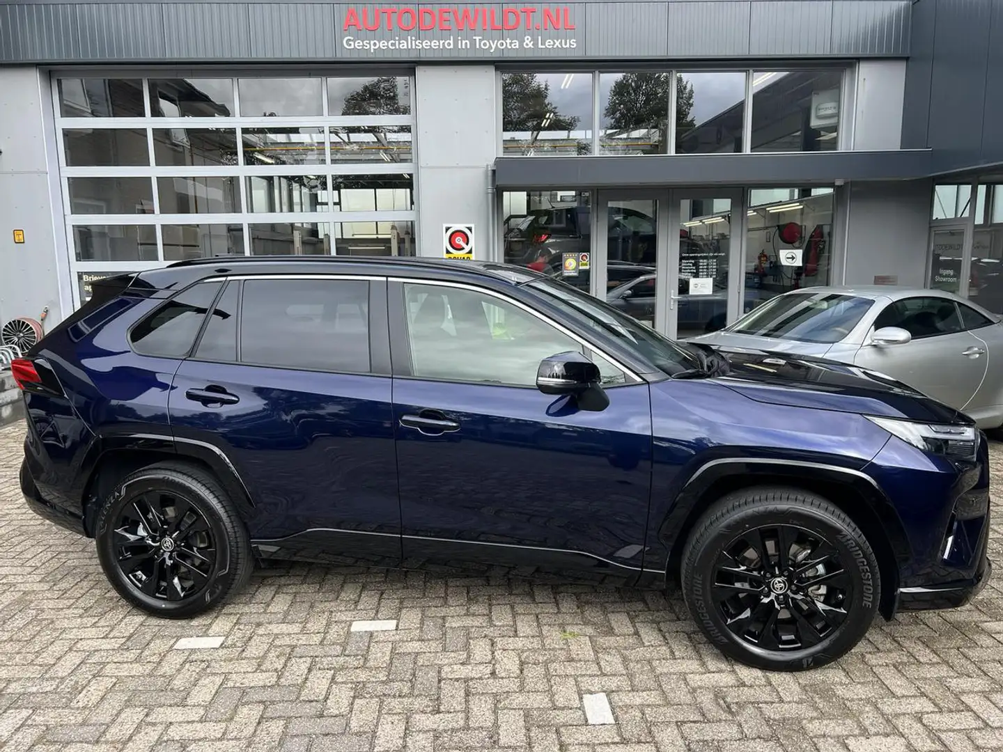 Toyota RAV 4 2.5 Hybrid Style Bi-tone A/T + FABRIEKSGARANTIE Bleu - 1