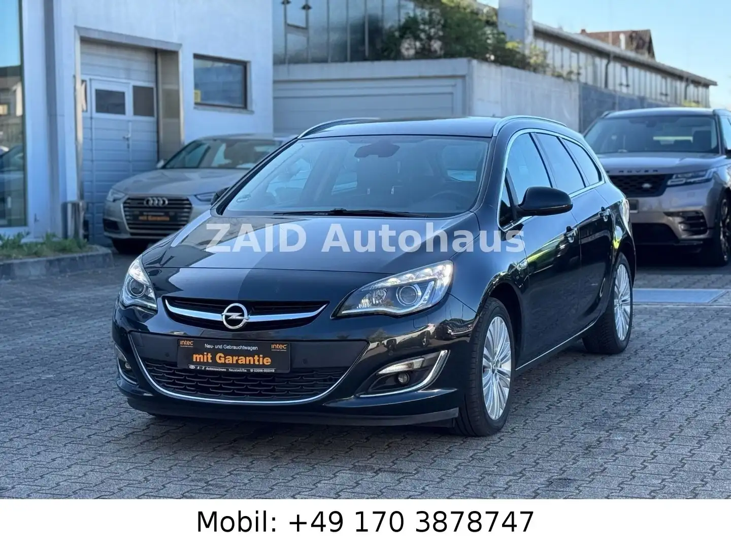 Opel Astra J Sports Tourer Exklusiv mit Autogas LPG Schwarz - 1