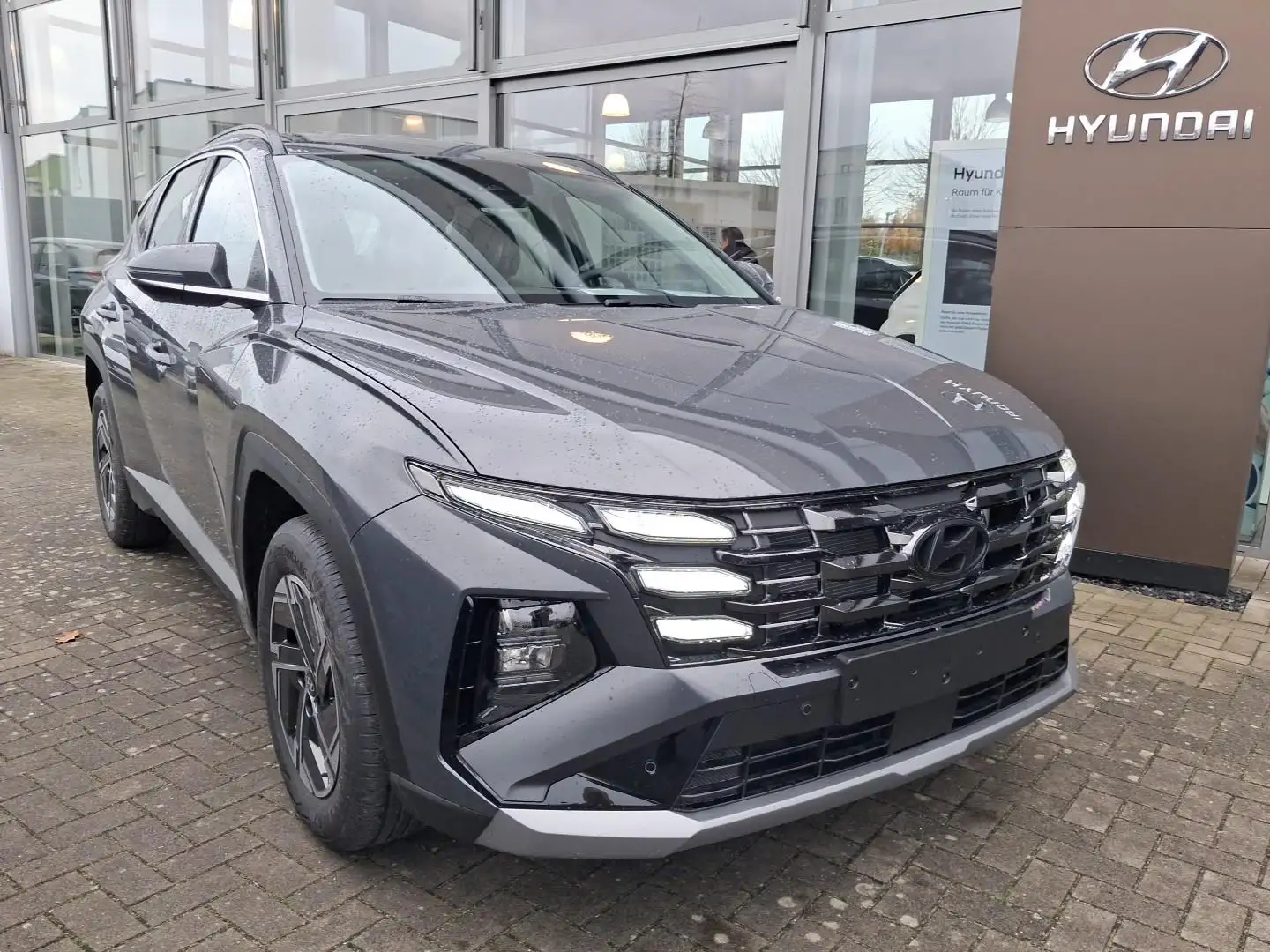 Hyundai TUCSON FL 1.6 T-GDI 7-DCT Select.Design-P.Navi Grau - 1